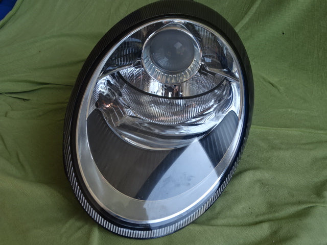 Porsche 997 Left Headlight USED  99763115703 99763115704